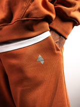 Blaze Orange AFLETE New Era joggers 003, hip logo close up