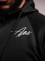 Black AFLETE Tech Series tracksuit 005, jacket chest logo close up