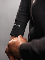 Black AFLETE Tech Series tracksuit 005, sleeve branding close up