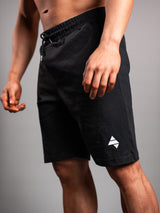 Black AFLETE Essential Urban shorts 012, thigh logo close up