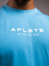 Bleu AFLETE workout tank top 014, chest logo close up