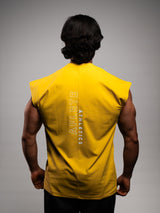 Model wearing the yellow AFLETE workout tank top 014, tank top back view
