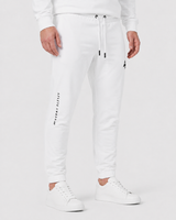 Model wearing the white AFLETE Urban joggers 017, joggers three quarter view
