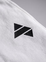 White AFLETE Urban joggers 017, leg wordmark close up