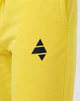 Model wearing the yellow AFLETE Urban joggers 017, joggers back view