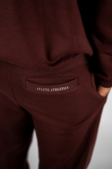 Burgundy AFLETE New Era tracksuit 001, joggers back pocket close up
