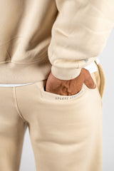 Desert Beige AFLETE New Era tracksuit 001, joggers back pocket close up