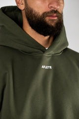 Forest Green AFLETE New Era tracksuit 001, hoodie chest logo close up