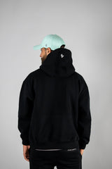 Black AFLETE New Era hoodie 002, chest logo close up