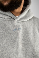 Grey AFLETE New Era hoodie 002, chest logo close up