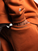 Blaze Orange AFLETE New Era joggers 003, back pocket logo close up