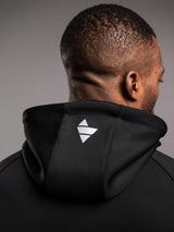 Black AFLETE Tech Series tracksuit 005, hood logo close up