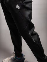 Black AFLETE Tech Series tracksuit 005, joggers logo close up