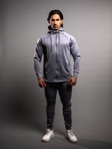 Model wearing the grey AFLETE Tech Series tracksuit 005, full outfit front view