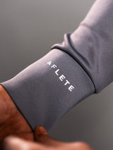 Grey AFLETE Tech Series tracksuit 005, sleeve branding close up