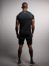 Model wearing the black AFLETE short-sleeve workout set 007, full outfit back view