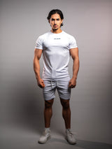 Model wearing the white AFLETE short-sleeve workout set 007, full outfit front view