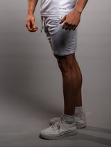 White AFLETE Tech Series gym shorts 010, side wordmark close up