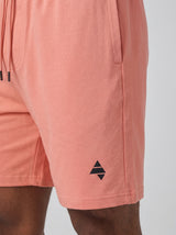 Coral Pink AFLETE Essential Urban shorts 012, logo and waistband close up