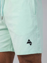 Light Mint AFLETE Essential Urban shorts 012, logo and waistband close up