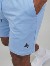 Periwinkle blue AFLETE Essential Urban shorts 012, logo and waistband close up