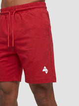 Red AFLETE Essential Urban shorts 012, logo and waistband close up