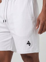 White AFLETE Essential Urban shorts 012, logo and waistband close up