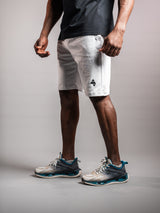 White AFLETE Essential Urban shorts 012, thigh logo close up
