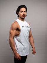 Model wearing the white AFLETE GYMAHOLIC gym tank top 013, tank top three quarter view