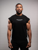 Model wearing the black AFLETE workout tank top 014, tank top front view