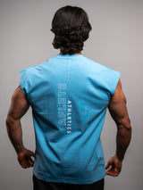 Model wearing the bleu AFLETE workout tank top 014, tank top back view