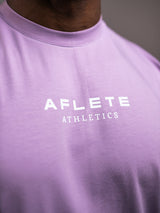 Purple AFLETE workout tank top 014, chest logo close up
