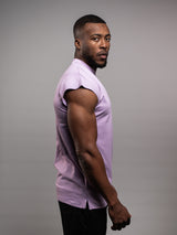 Model wearing the purple AFLETE workout tank top 014, tank top side view