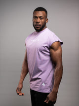 Model wearing the purple AFLETE workout tank top 014, tank top three quarter view