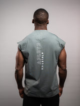 Model wearing the sage grey AFLETE workout tank top 014, tank top back view