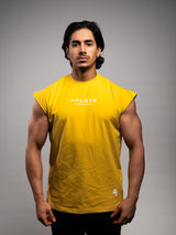 Model wearing the yellow AFLETE workout tank top 014, tank top front view