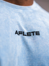 Blue AFLETE Washed Essential oversized T-shirt 015, chest logo close up