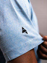 Blue AFLETE Washed Essential oversized T-shirt 015, sleeve geometric logo close up