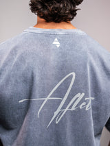 Grey Ash AFLETE Washed Essential oversized T-shirt 015, back signature close up
