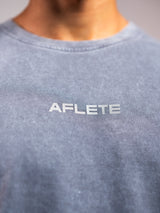 Grey Ash AFLETE Washed Essential oversized T-shirt 015, chest logo close up