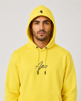 Model wearing the yellow AFLETE Urban hoodie 016, hood up front view