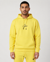 Model wearing the yellow AFLETE Urban hoodie 016, hoodie front view
