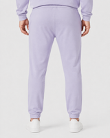 Model wearing the mauve AFLETE Urban joggers 017, joggers back view