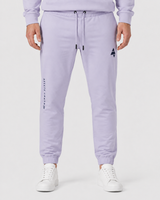 Model wearing the mauve AFLETE Urban joggers 017, joggers front view